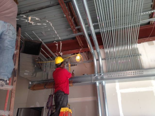 Electrician working on building
